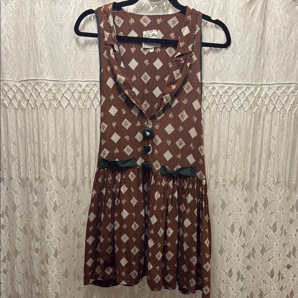 Vintage Janice McCarty Brown Sleeveless Dress with Geometric Pattern. fun button